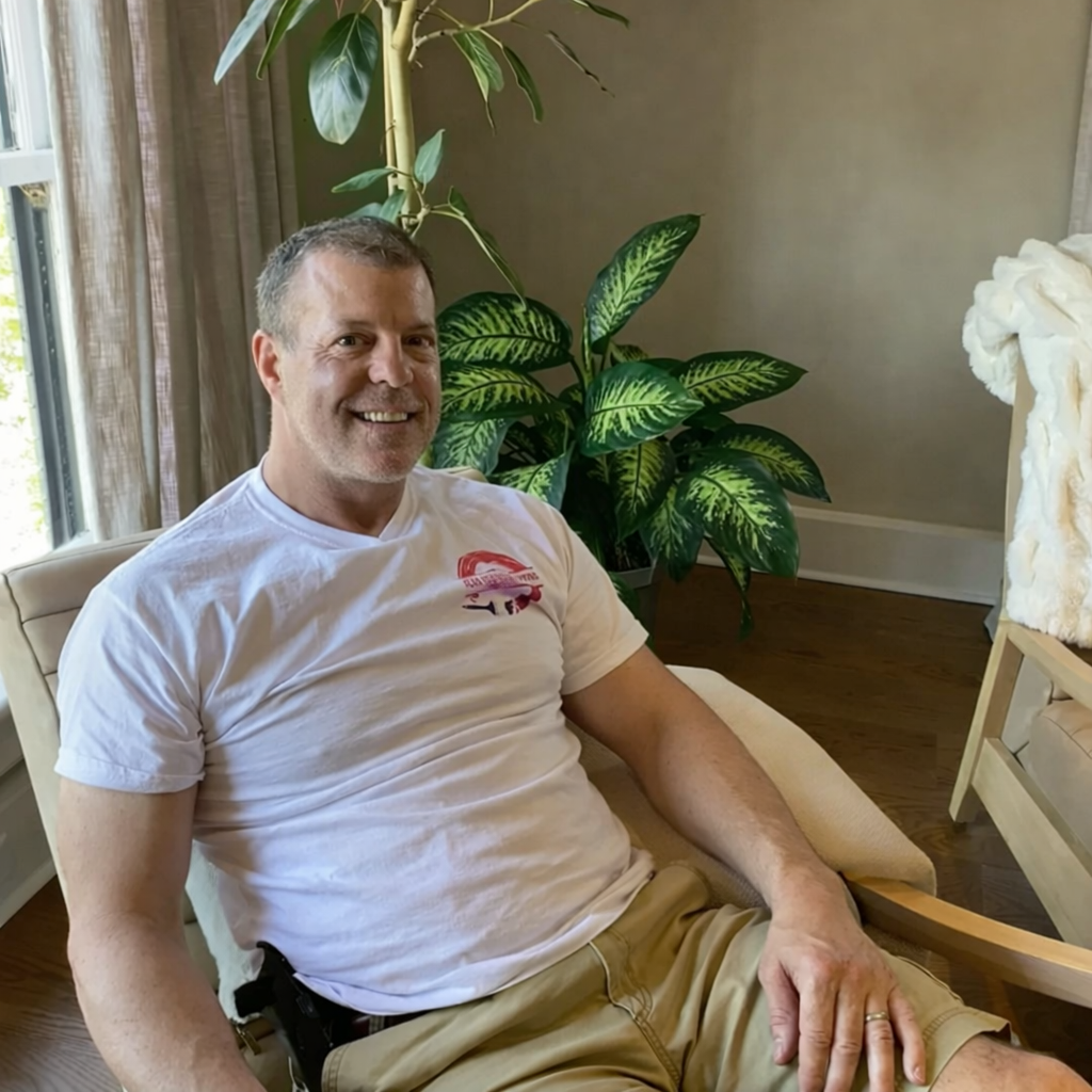 Alan Robinson sitting and smiling — Nashville house painter and professional fine artist